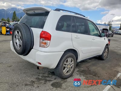 Trzecie zdjęcie samochodu z tyłu: 2002 TOYOTA RAV4 BASE VIN:JTEGH20V320060402 - miniatura