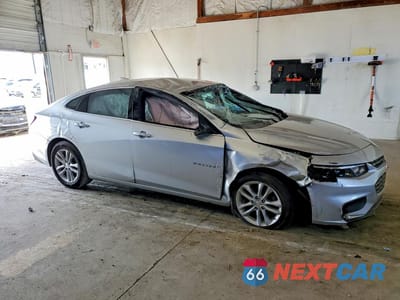Czwarte zdjęcie samochodu z boku: 2017 CHEVROLET MALIBU LT VIN:1G1ZE5STXHF245970 - miniatura