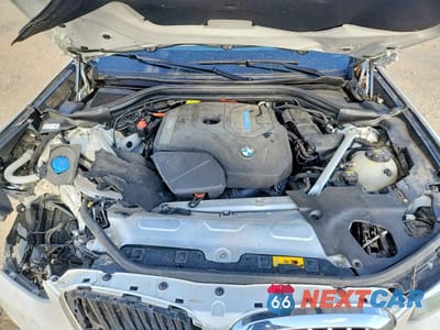 Zdjęcie 12 z 13 samochodu: 2021 BMW X3 XDRIVE30E VIN:5UXTS1C06M9G72429 - miniatura