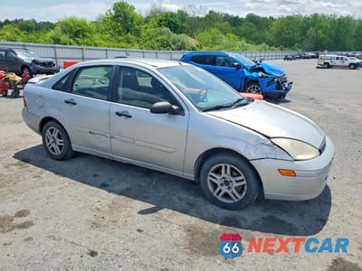 Czwarte zdjęcie samochodu z boku: 2001 FORD FOCUS SE VIN:1FAFP34331W161099 - miniatura