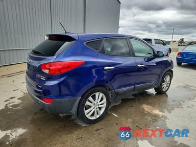 Trzecie zdjęcie samochodu z tyłu: 2012 HYUNDAI TUCSON LIMITED VIN:KM8JUCAC7CU424500 - miniatura