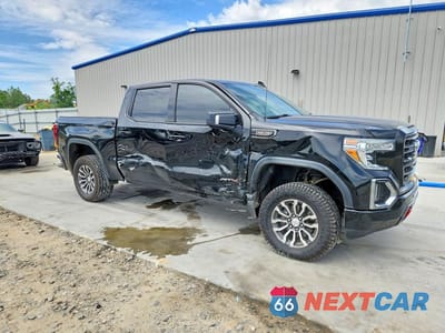 Czwarte zdjęcie samochodu z boku: 2020 GMC SIERRA K1500 AT4 VIN:3GTP9EEL2LG118507 - miniatura