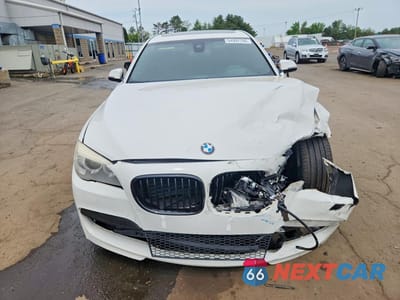 Piąte zdjęcie samochodu w środku: 2014 BMW 750 LXI VIN:WBAYF8C56ED141806 - miniatura
