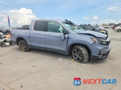 Czwarte zdjęcie samochodu z boku: 2022 HONDA RIDGELINE RTL-E VIN:5FPYK3F79NB038880 - miniatura