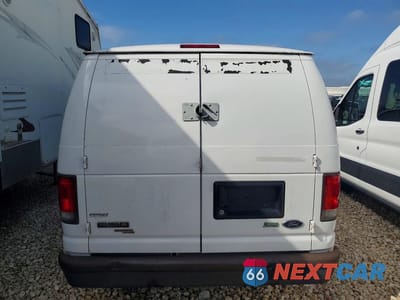 Zdjęcie 6 z 13 samochodu: 2014 FORD ECONOLINE E150 VAN VIN:1FTNE1EW7EDA11135 - miniatura