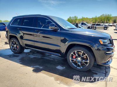 Czwarte zdjęcie samochodu z boku: 2015 JEEP GRAND CHEROKEE SRT-8 VIN:1C4RJFDJ2FC752350 - miniatura