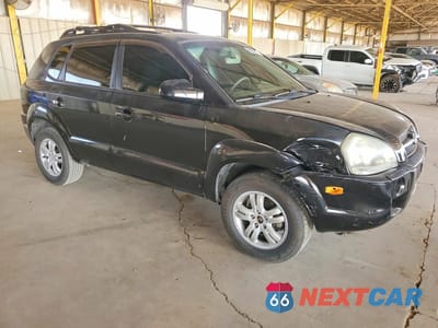 Czwarte zdjęcie samochodu z boku: 2006 HYUNDAI TUCSON GLS VIN:KM8JN12D66U272500 - miniatura