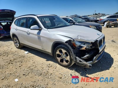 Czwarte zdjęcie samochodu z boku: 2014 BMW X1 SDRIVE28I VIN:WBAVM1C54EVW47094 - miniatura