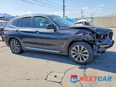 Czwarte zdjęcie samochodu z boku: 2018 BMW X3 XDRIVE30I VIN:5UXTR9C55JLD62406 - miniatura