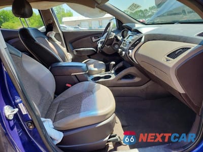 Zdjęcie 7 z 13 samochodu: 2011 HYUNDAI TUCSON GLS VIN:KM8JU3AC7BU171077 - miniatura
