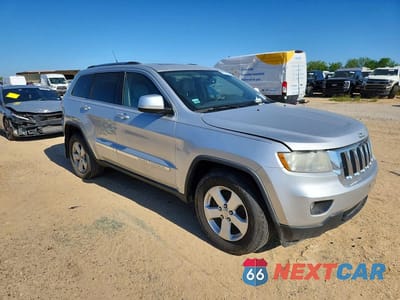 Czwarte zdjęcie samochodu z boku: 2011 JEEP GRAND CHEROKEE LAREDO VIN:1J4RR4GT7BC509843 - miniatura