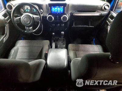 Zdjęcie 8 z 13 samochodu: 2011 JEEP WRANGLER UNLIMITED SAHARA VIN:1J4BA5H16BL600159 - miniatura