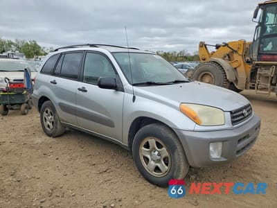 Czwarte zdjęcie samochodu z boku: 2002 TOYOTA RAV4 BASE VIN:JTEGH20V120056736 - miniatura