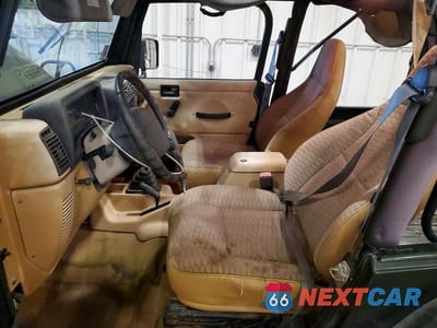 Zdjęcie 7 z 13 samochodu: 1998 JEEP WRANGLER / TJ SE VIN:1J4FY29P6WP770356 - miniatura
