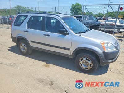 Czwarte zdjęcie samochodu z boku: 2003 HONDA CR-V LX VIN:JHLRD68413C000679 - miniatura
