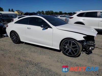 Czwarte zdjęcie samochodu z boku: 2022 MERCEDES-BENZ E 450 VIN:W1K1J5JB1NF184759 - miniatura