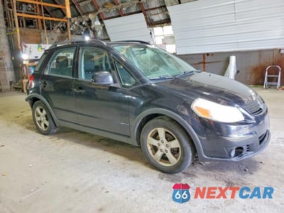 Czwarte zdjęcie samochodu z boku: 2012 SUZUKI SX4 VIN:JS2YB5A34C6304331 - miniatura