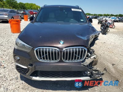 Piąte zdjęcie samochodu w środku: 2018 BMW X1 XDRIVE28I VIN:WBXHT3C31J5L27998 - miniatura