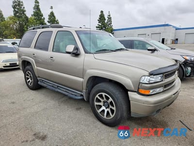 Czwarte zdjęcie samochodu z boku: 2003 CHEVROLET TAHOE K1500 VIN:1GNEK13Z53R102756 - miniatura