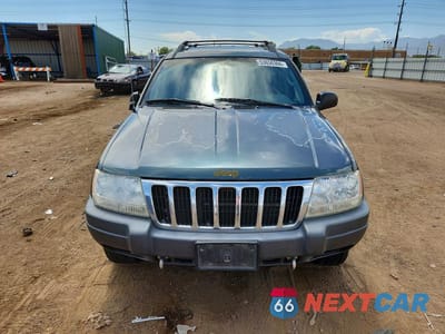 Piąte zdjęcie samochodu w środku: 2002 JEEP GRAND CHEROKEE VIN:1J8GW68J12C206709 - miniatura