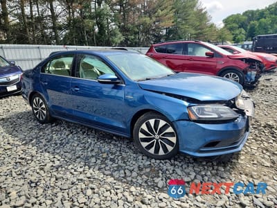 Czwarte zdjęcie samochodu z boku: 2016 VOLKSWAGEN JETTA HYBRID VIN:3VW637AJ3GM419563 - miniatura
