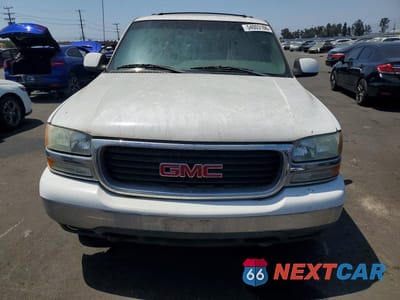 Piąte zdjęcie samochodu w środku: 2002 GMC YUKON VIN:1GKEK13TX2R259111 - miniatura