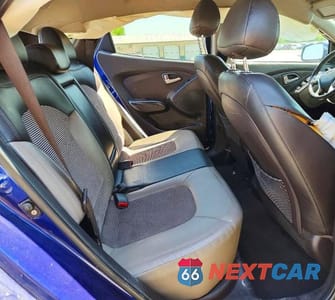Zdjęcie 11 z 13 samochodu: 2011 HYUNDAI TUCSON GLS VIN:KM8JU3AC7BU171077 - miniatura