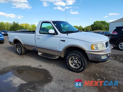 Czwarte zdjęcie samochodu z boku: 1997 FORD F150 VIN:1FTDF1866VNA85256 - miniatura