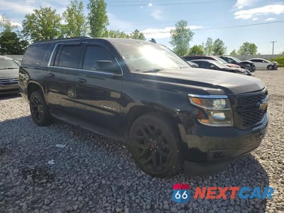 Czwarte zdjęcie samochodu z boku: 2019 CHEVROLET SUBURBAN K1500 LT VIN:1GNSKHKC6KR143937 - miniatura
