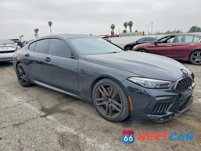 Czwarte zdjęcie samochodu z boku: 2022 BMW M8 VIN:WBSGV0C02NCG90430 - miniatura