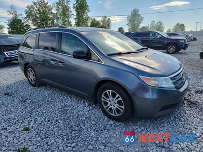 Czwarte zdjęcie samochodu z boku: 2012 HONDA ODYSSEY EXL VIN:5FNRL5H65CB131113 - miniatura