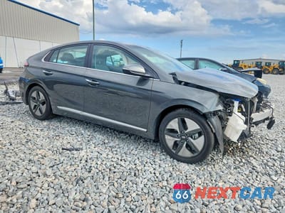 Czwarte zdjęcie samochodu z boku: 2021 HYUNDAI IONIQ LIMITED VIN:KMHC05LC8MU251486 - miniatura