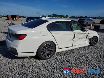 Trzecie zdjęcie samochodu z tyłu: 2021 BMW 750 XI VIN:WBA7U2C00MCF14655 - miniatura