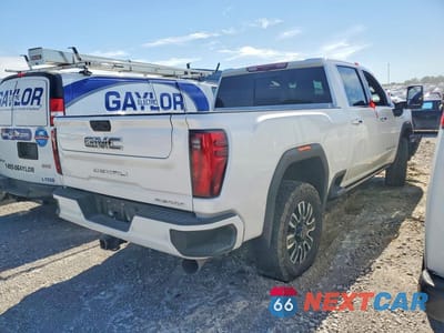 Trzecie zdjęcie samochodu z tyłu: 2024 GMC SIERRA K2500 DENALI ULTIMATE VIN:1GT49XEYXRF143398 - miniatura