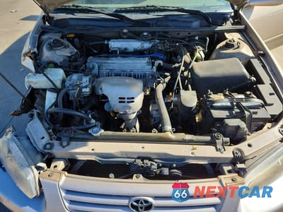 Zdjęcie 11 z 12 samochodu: 1999 TOYOTA CAMRY LE VIN:JT2BG22K3X0360400 - miniatura