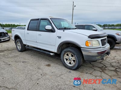 Czwarte zdjęcie samochodu z boku: 2002 FORD F150 SUPERCREW VIN:1FTRW08682KB34597 - miniatura