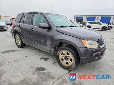 Czwarte zdjęcie samochodu z boku: 2012 SUZUKI GRAND VITARA PREMIUM VIN:JS3TD0D28C4100164 - miniatura
