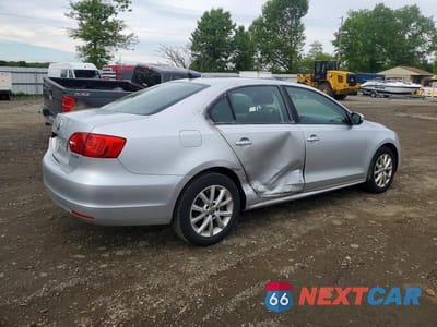 Trzecie zdjęcie samochodu z tyłu: 2012 VOLKSWAGEN JETTA SE VIN:3VWDP7AJ3CM414613 - miniatura