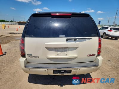 Zdjęcie 6 z 13 samochodu: 2010 GMC YUKON DENALI VIN:1GKUCEEF2AR230790 - miniatura