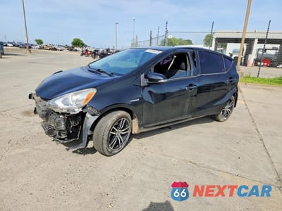 2015 TOYOTA PRIUS C THREE JTDKDTB32F1100769 - główne zdjęcie licytacji z USA - miniatura