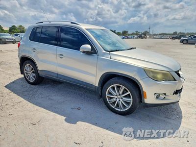 Czwarte zdjęcie samochodu z boku: 2010 VOLKSWAGEN TIGUAN S VIN:WVGAV7AX0AW520963 - miniatura