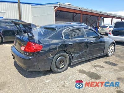 Trzecie zdjęcie samochodu z tyłu: 2004 INFINITI G35 BASE VIN:JNKCV51E24M617936 - miniatura
