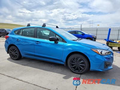 Czwarte zdjęcie samochodu z boku: 2018 SUBARU IMPREZA VIN:4S3GTAA64J3732453 - miniatura