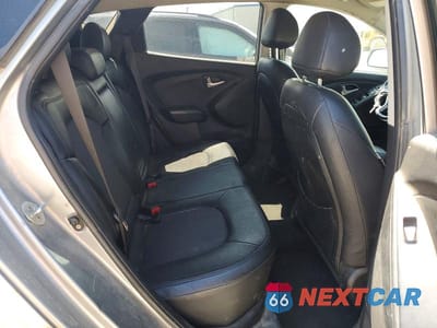 Zdjęcie 11 z 13 samochodu: 2013 HYUNDAI TUCSON GLS VIN:KM8JUCAC6DU568539 - miniatura