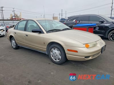 Czwarte zdjęcie samochodu z boku: 2000 SATURN SL1 VIN:1G8ZH5283YZ175814 - miniatura