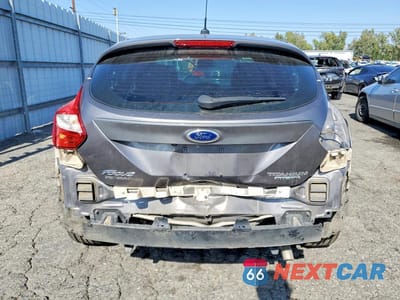 Zdjęcie 6 z 13 samochodu: 2014 FORD FOCUS TITANIUM VIN:1FADP3N21EL311957 - miniatura