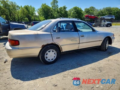 Trzecie zdjęcie samochodu z tyłu: 1995 TOYOTA CAMRY DX VIN:JT2SK11E2S0326624 - miniatura
