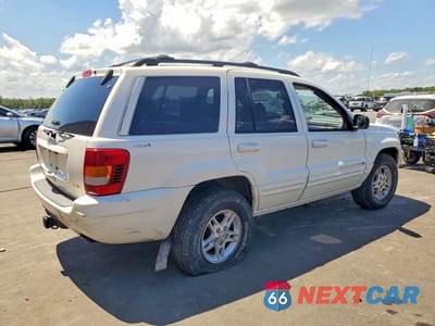 Trzecie zdjęcie samochodu z tyłu: 2000 JEEP GRAND CHEROKEE LIMITED VIN:1J4GW58N1YC382098 - miniatura