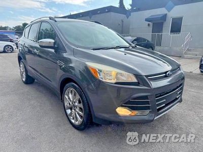 Czwarte zdjęcie samochodu z boku: 2016 FORD ESCAPE SE VIN:1FMCU0GX4GUC35892 - miniatura