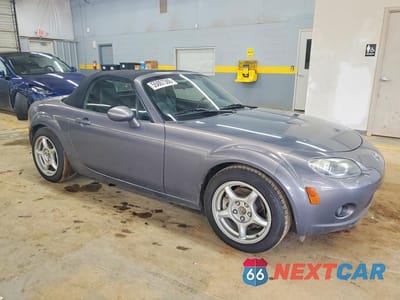 Czwarte zdjęcie samochodu z boku: 2006 MAZDA MX-5 MIATA VIN:JM1NC25FX60117907 - miniatura